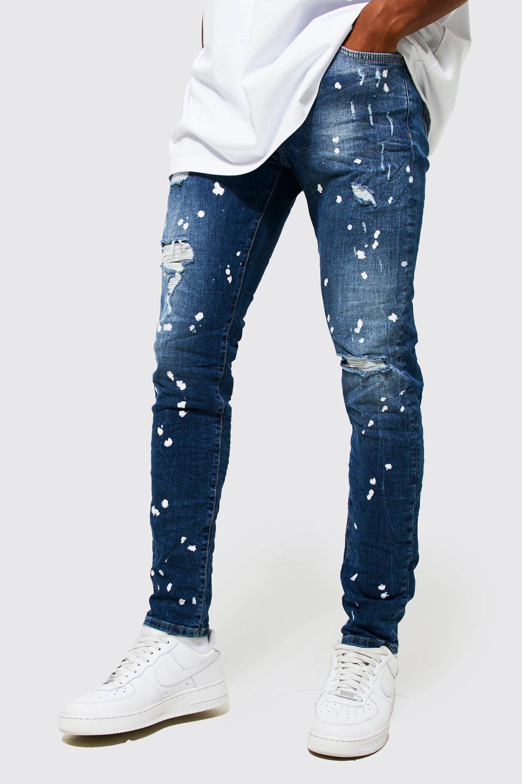 Jean skinny dechire a taches de peinture boohooMAN FR